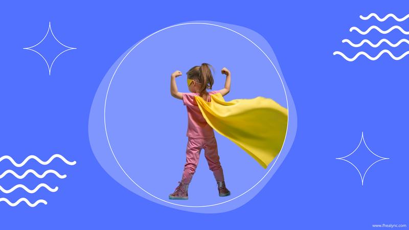 Young girl in pink with yellow superhero cape, arms raised, symbolizing self-love. Discover how to teach your daughter self love!
