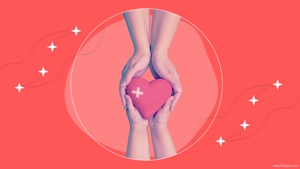 Hands holding a healing heart, symbolizing self-love and health.