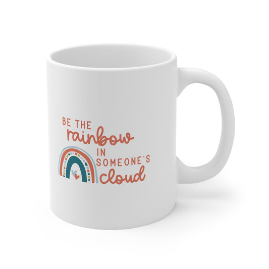 Soyez l’arc-en-ciel dans le nuage de quelqu’un 11oz Mug